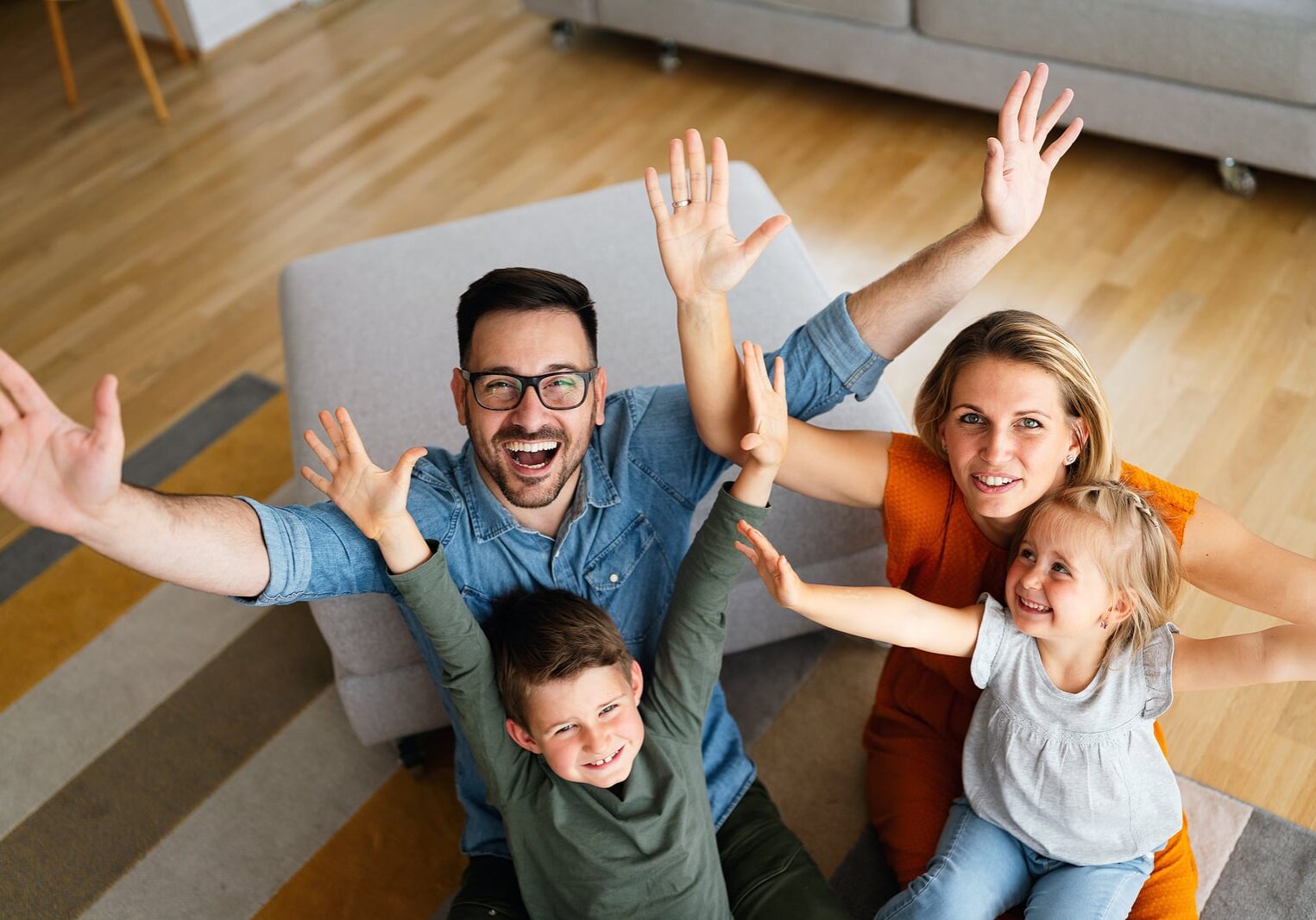 Happy Family Having Fun Time At Home. Parents Children Love Happ Happy family having fun time at home. Parents children love happiness concept.